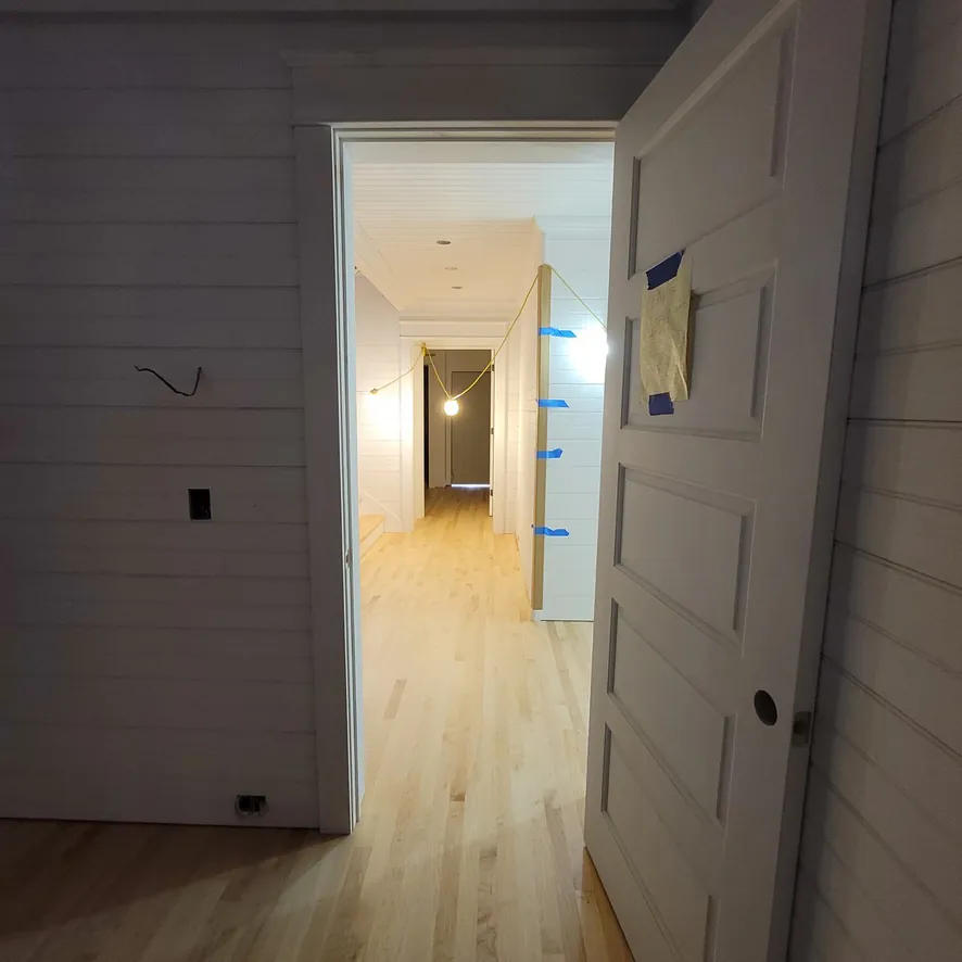 1 Wood Floors  Maple flooring doorway transition with invisible finish  Harbor Springs MI  Installed by 1 Wood Floors, Livonia, MI