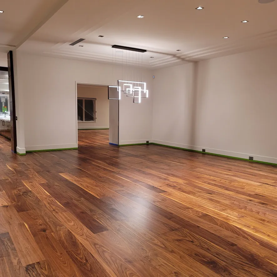 FAS walnut flooring in formal dining room with crystal chandelier  Northville MI  1 Wood Floors