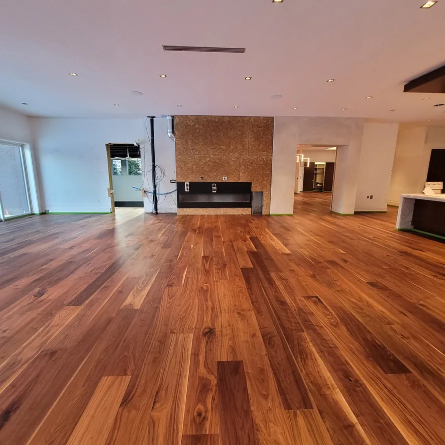 Wide view of walnut flooring with fireplace and built-ins  Northville MI  1 Wood Floors
